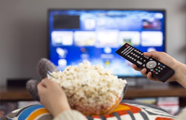 young woman watching tv