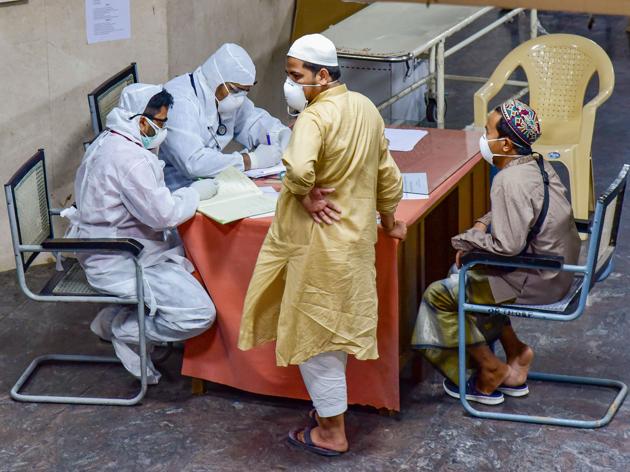 Hyderabad: Medics interact with Indonesian tourists at a COVID-19 helpdesk, in the wake of deadly coronavirus, at Hyderabad Gandhi Hospital, Monday, March 16, 2020.