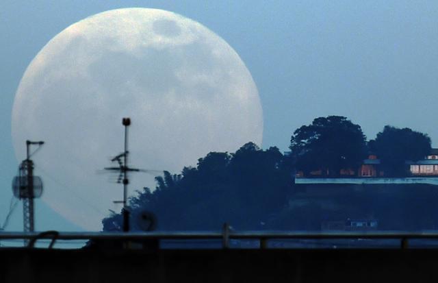A 'supermoon' is seen during the stages of a total eclipse in Caracas. A 'supermoon' is seen during the stages of a total eclipse in Caracas.