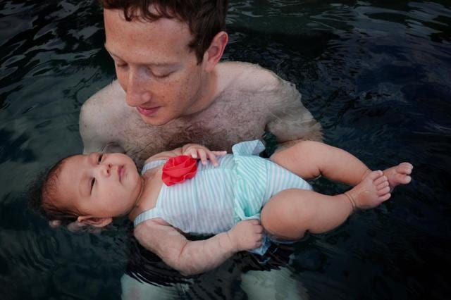 Zuckberg with his daughter Max Zuckberg with his daughter Max