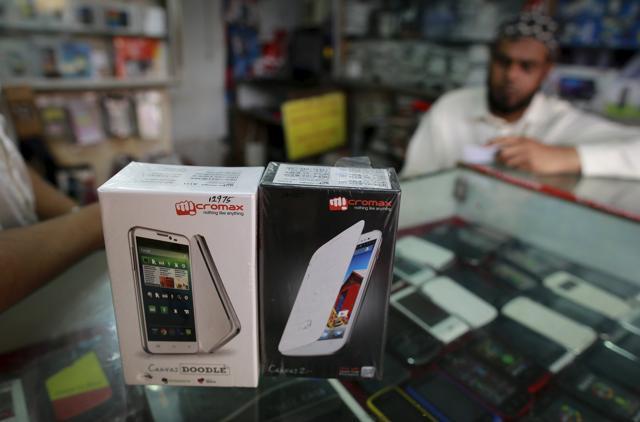Micromax mobile phones are displayed at a mobile store in Mumbai. Micromax mobile phones are displayed at a mobile store in Mumbai.