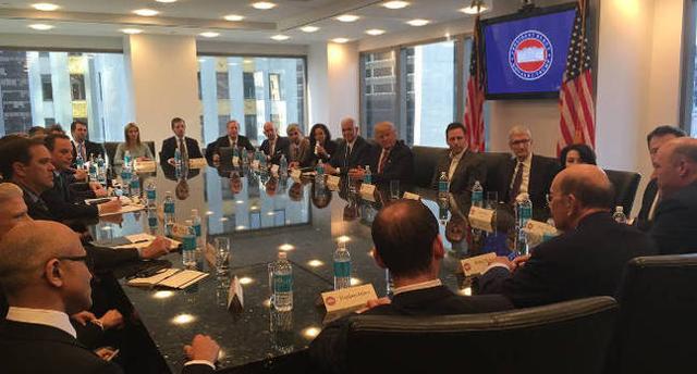 The picture shows US president Donald Trump with top executives from technology giants such as Apple in a meeting. The picture shows US president Donald Trump with top executives from technology giants such as Apple in a meeting.