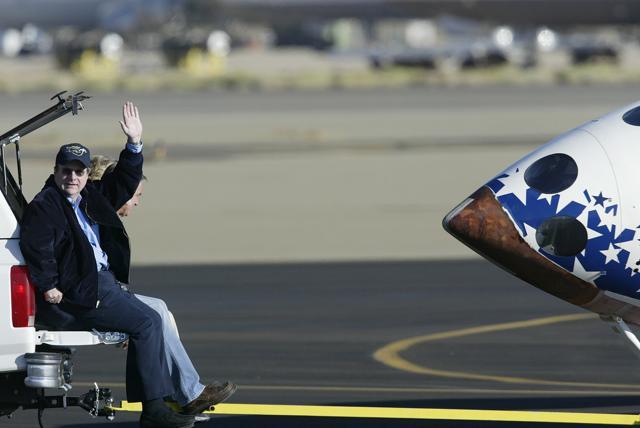 (FILES) In this file photo taken on October 4, 2004 Paul Allen, a financial backer of the Mojave Aerospace Ventures Team, waves to reporters after the SpaceShipOne aircraft landed at the Mojave Airport Civilian Test Center in Mojave, CA. (FILES) In this file photo taken on October 4, 2004 Paul Allen, a financial backer of the Mojave Aerospace Ventures Team, waves to reporters after the SpaceShipOne aircraft landed at the Mojave Airport Civilian Test Center in Mojave, CA.
