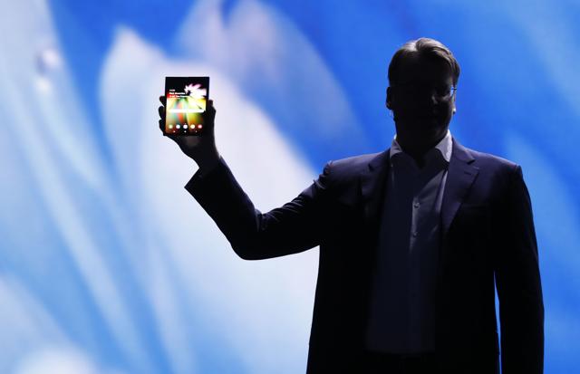 Justin Denison, Samsung Electronics senior vice president of Mobile Product Marketing, speaks during the unveiling of Samsung's new foldable screen smart phone. Justin Denison, Samsung Electronics senior vice president of Mobile Product Marketing, speaks during the unveiling of Samsung's new foldable screen smart phone.