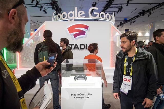 Attendees look at the Google Inc. Stadia game controller at the Game Developers Conference in San Francisco, California, U.S., on Wednesday, March 20, 2019. Attendees look at the Google Inc. Stadia game controller at the Game Developers Conference in San Francisco, California, U.S., on Wednesday, March 20, 2019.
