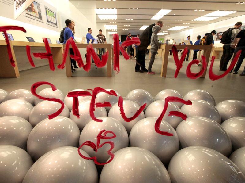 A tribute message to the late Steve Jobs written in lipstick is seen on the window of the Apple Store in Santa Monica, California. A tribute message to the late Steve Jobs written in lipstick is seen on the window of the Apple Store in Santa Monica, California.