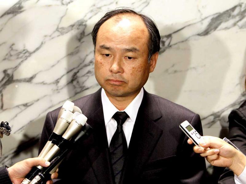Softbank Mobile's chief executive officer Masayoshi Son speaks to the media regarding the obituary of Apple's founder Steve Jobs at Son's company in Tokyo. Softbank Mobile's chief executive officer Masayoshi Son speaks to the media regarding the obituary of Apple's founder Steve Jobs at Son's company in Tokyo.