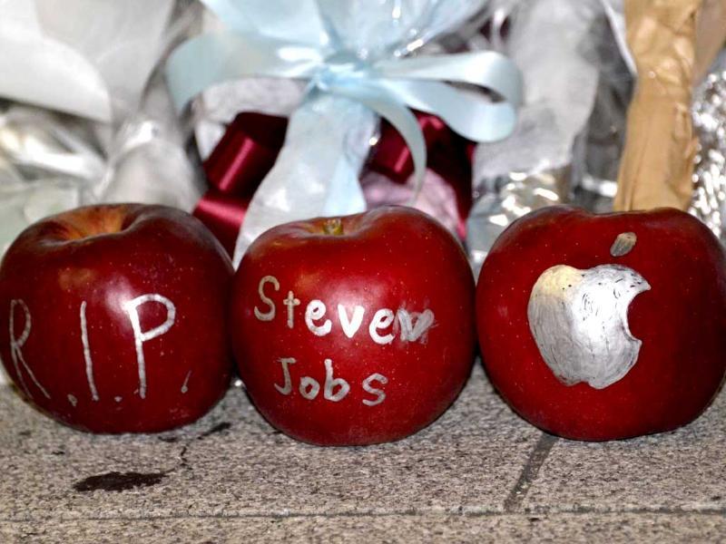 Apples with messages paying tribute to Apple co-founder Steve Jobs outside an Apple store in Tokyo. Apples with messages paying tribute to Apple co-founder Steve Jobs outside an Apple store in Tokyo.