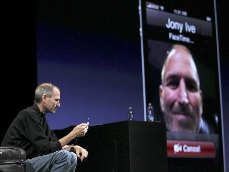 Apple CEO Steve Jobs demonstrates video conferencing with Apple Senior Vice President for Industrial Design Jonathan Ive at the unveiling of the iPhone 4 in San Francisco, California in this June 7, 2010, file photo. Apple CEO Steve Jobs demonstrates video conferencing with Apple Senior Vice President for Industrial Design Jonathan Ive at the unveiling of the iPhone 4 in San Francisco, California in this June 7, 2010, file photo.