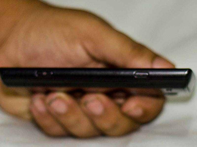 There are a power button and a camera button to the right. Excuse the image quality. It went out of focus, a bit. There are a power button and a camera button to the right. Excuse the image quality. It went out of focus, a bit.