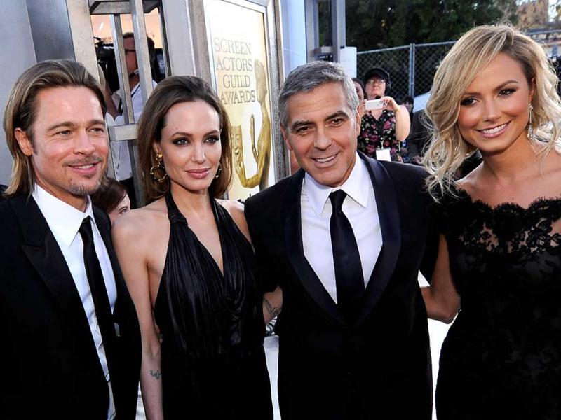 Brad Pitt, Angelina Jolie, George Clooney and Stacy Keiber pose together. Brad Pitt, Angelina Jolie, George Clooney and Stacy Keiber pose together.