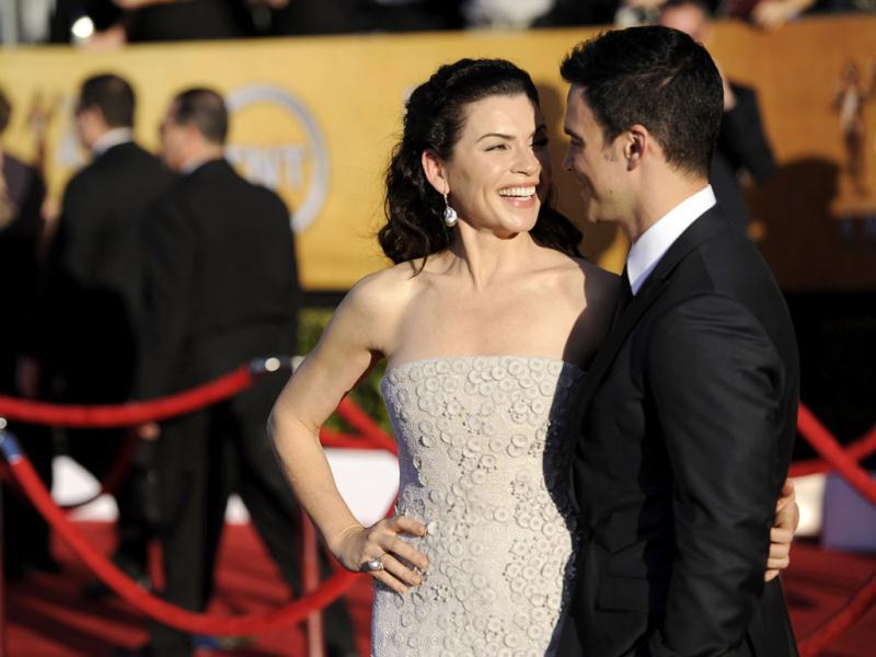 Julianna Margulies and Keith Lieberthal smile at each other. Julianna Margulies and Keith Lieberthal smile at each other.