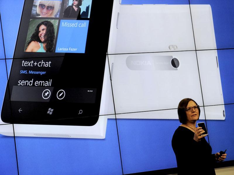 Nokia Smart devices executive vice-president, Jo Harlow presents the new Lumia mobile phone during a press conference in Barcelona on the opening day of the Mobile World Congress. The 2012 Mobile World Congress, the world's biggest mobile fair, will be held from February 27 to March 1 in Barcelona. AFP/Lluis Gene Nokia Smart devices executive vice-president, Jo Harlow presents the new Lumia mobile phone during a press conference in Barcelona on the opening day of the Mobile World Congress. The 2012 Mobile World Congress, the world's biggest mobile fair, will be held from February 27 to March 1 in Barcelona. AFP/Lluis Gene