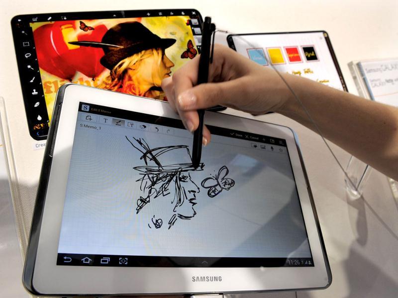 A hostess draws on the Samsung Galaxi Note 10.1 Tablet during a presentation in Barcelona on February 27, 2012 on the opening day of the Mobile World Congress. The 2012 Mobile World Congress, the world's biggest mobile fair, is held from February 27 to March 1 in Barcelona. AFP/Lluis Gene A hostess draws on the Samsung Galaxi Note 10.1 Tablet during a presentation in Barcelona on February 27, 2012 on the opening day of the Mobile World Congress. The 2012 Mobile World Congress, the world's biggest mobile fair, is held from February 27 to March 1 in Barcelona. AFP/Lluis Gene