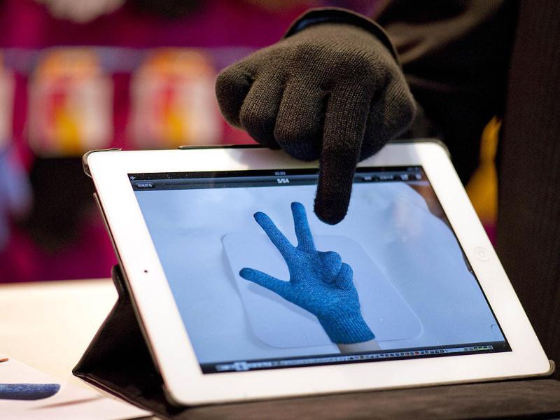A touch screen sensitive glove from 'Touching' is being demonstrated at the world's biggest high-tech fair, the CeBIT, on March 6, 2012 in Hanover, central Germany. Brazil is the partner country of the CeBIT 2012, which is running until March 10. AFP PHOTO / ODD ANDERSEN A touch screen sensitive glove from 'Touching' is being demonstrated at the world's biggest high-tech fair, the CeBIT, on March 6, 2012 in Hanover, central Germany. Brazil is the partner country of the CeBIT 2012, which is running until March 10. AFP PHOTO / ODD ANDERSEN