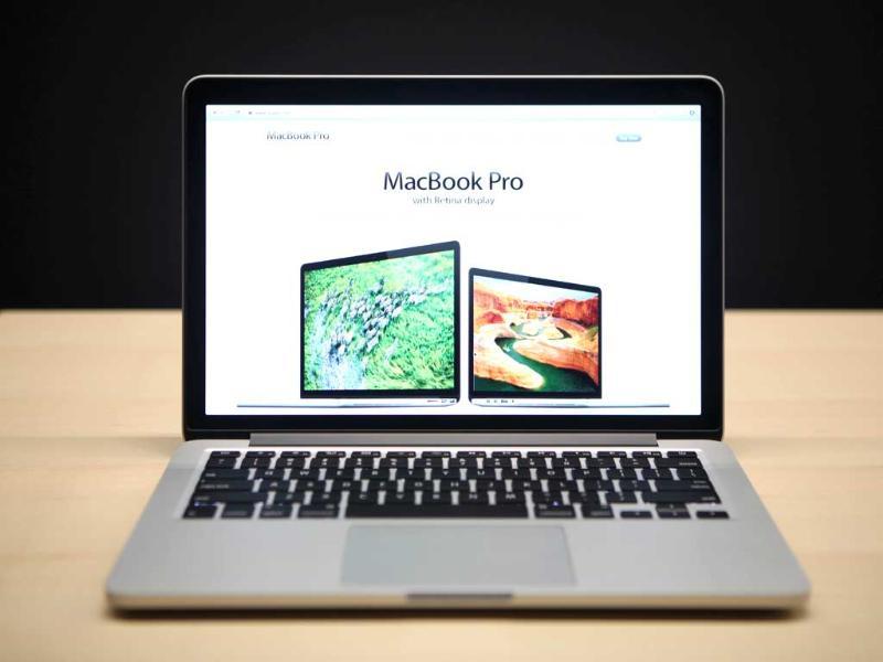 The new 13 inch Macbook Pro with a Retina display is seen during Apple's special event at the California Theatre in San Jose in California. AFP Photo/Kimihiro Hoshino The new 13 inch Macbook Pro with a Retina display is seen during Apple's special event at the California Theatre in San Jose in California. AFP Photo/Kimihiro Hoshino
