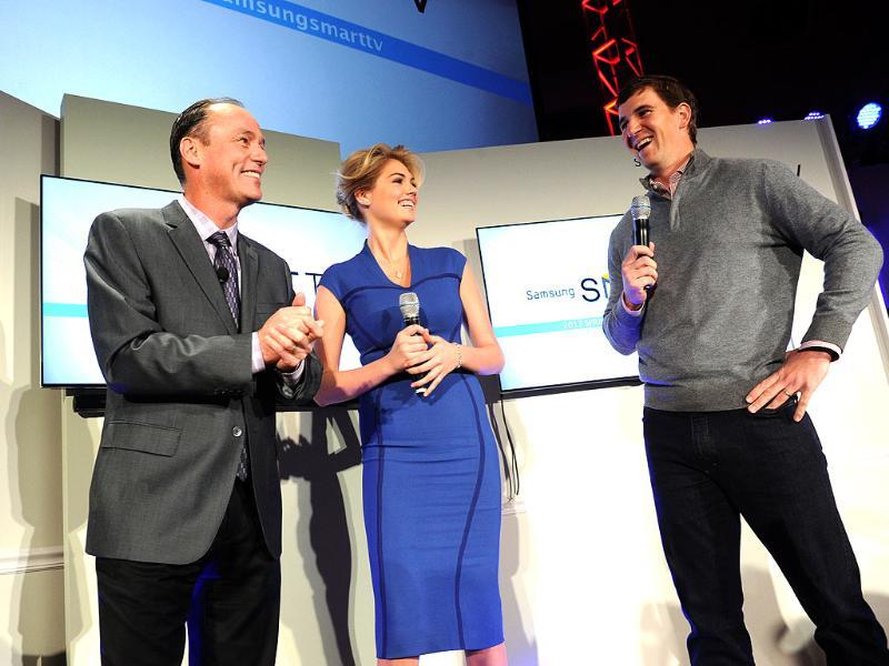 Tim Baxter, left, President, Samsung Electronics America, model Kate Upton and football quarterback Eli Manning showcase the 2013 line of Smart TVs, Wednesday, March 20, 2013, in New York. Photo: Diane Bondareff/Invision for Samsung/AP Images Tim Baxter, left, President, Samsung Electronics America, model Kate Upton and football quarterback Eli Manning showcase the 2013 line of Smart TVs, Wednesday, March 20, 2013, in New York. Photo: Diane Bondareff/Invision for Samsung/AP Images