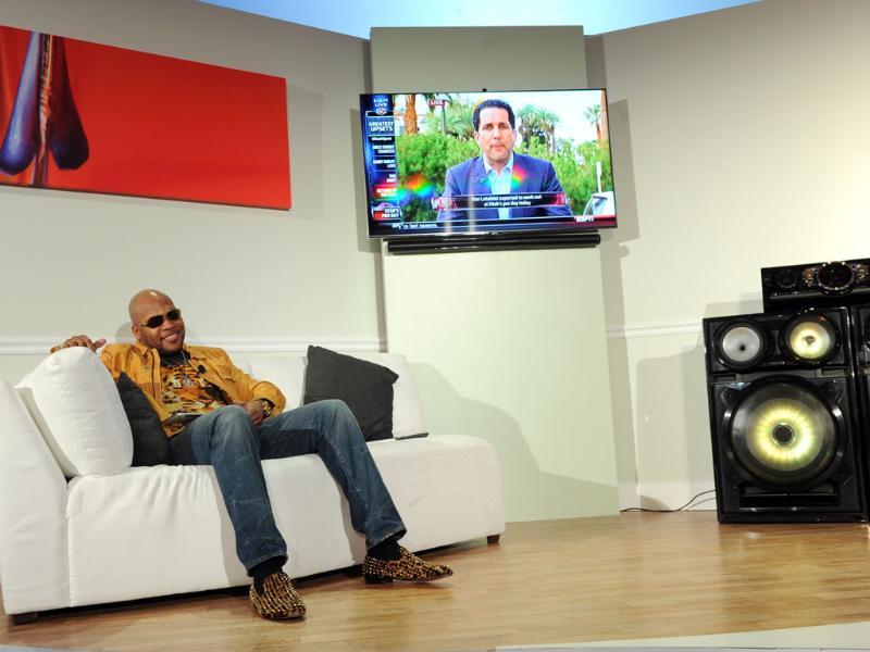 Hip-hop artist Flo Rida helps Samsung showcase its 2013 line of Smart TVs, Wednesday, March 20, 2013, in New York. Photo: Diane Bondareff/Invision for Samsung/AP Hip-hop artist Flo Rida helps Samsung showcase its 2013 line of Smart TVs, Wednesday, March 20, 2013, in New York. Photo: Diane Bondareff/Invision for Samsung/AP