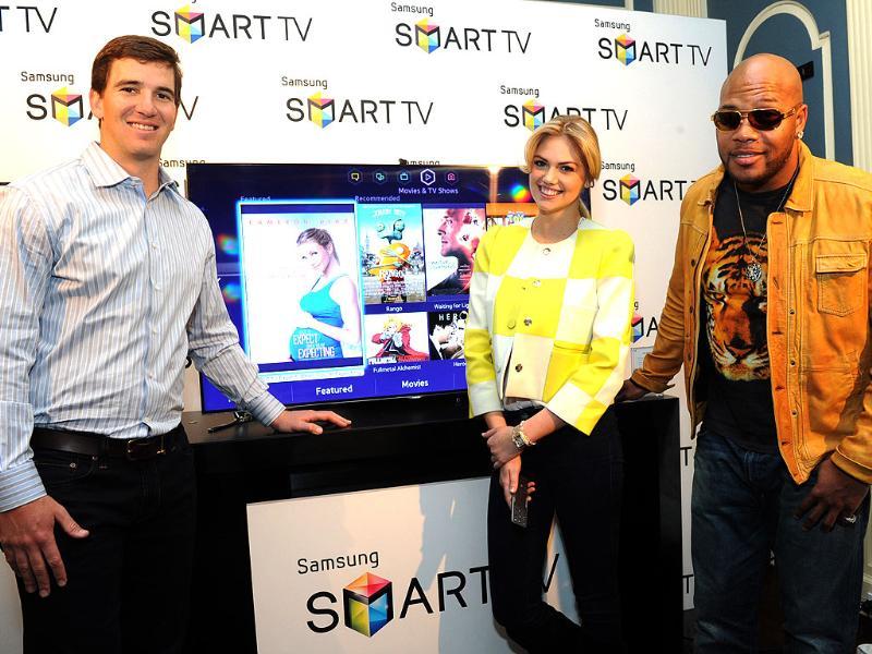 Football quarterback Eli Manning, model Kate Upton and hip-hop artist Flo Rida join Samsung at its launch event for the 2013 line of Smart TVs, Wednesday, March 20, 2013, in New York. Photo: Diane Bondareff/Invision for Samsung/AP Images Football quarterback Eli Manning, model Kate Upton and hip-hop artist Flo Rida join Samsung at its launch event for the 2013 line of Smart TVs, Wednesday, March 20, 2013, in New York. Photo: Diane Bondareff/Invision for Samsung/AP Images