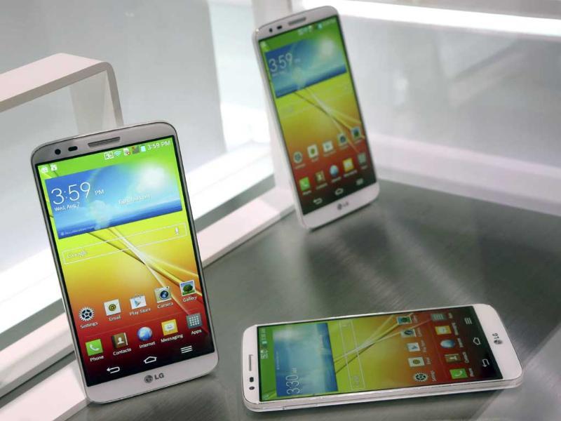 The LG G2 smart phone is on display during a news conference in New York. Photo: AP/Mary Altaffer The LG G2 smart phone is on display during a news conference in New York. Photo: AP/Mary Altaffer
