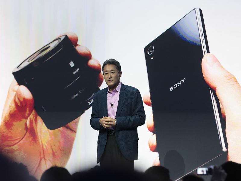 Kazuo Hirai, President and CEO of Sony presents the new Sony Xperia Z1 smartphone and an attachable lens style camera for smartphones in Berlin. Photo:AP/Markus Schreiber Kazuo Hirai, President and CEO of Sony presents the new Sony Xperia Z1 smartphone and an attachable lens style camera for smartphones in Berlin. Photo:AP/Markus Schreiber