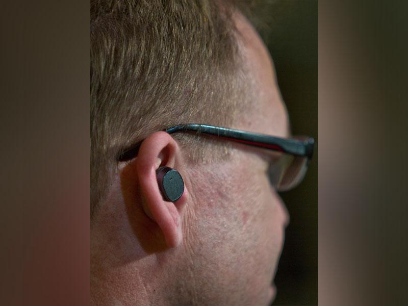 Steve Sinclair, Motorola's vice president of product management, wears the new Moto Hint Bluetooth headset during an interview on August 27, 2014 in New York. (AP/Bebeto Matthews) Steve Sinclair, Motorola's vice president of product management, wears the new Moto Hint Bluetooth headset during an interview on August 27, 2014 in New York. (AP/Bebeto Matthews)