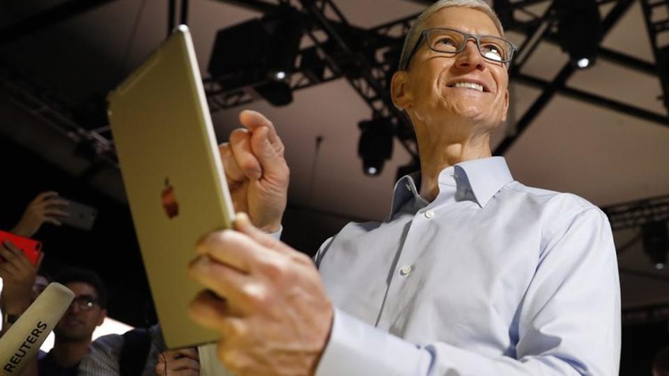 Tim Cook, CEO, holds an iPad Pro after his keynote address to Apple's annual world wide developer conference (WWDC) in San Jose, California, June 5, 2017.