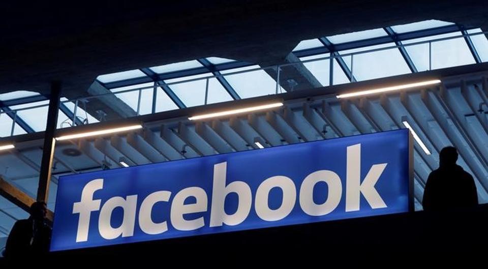 Facebook logo is seen at a start-up companies gathering at Paris' Station F in Paris, France.