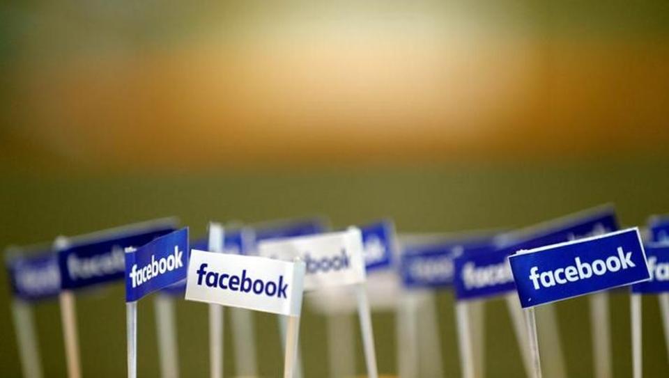 Miniature Facebook banners are seen on snacks prepared for the visit by Facebook's Chief Operating Officer in Paris, France.