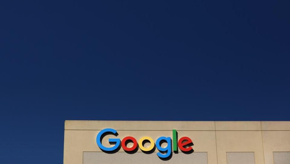 The Google logo is pictured atop an office building in Irvine, California, on August 7.