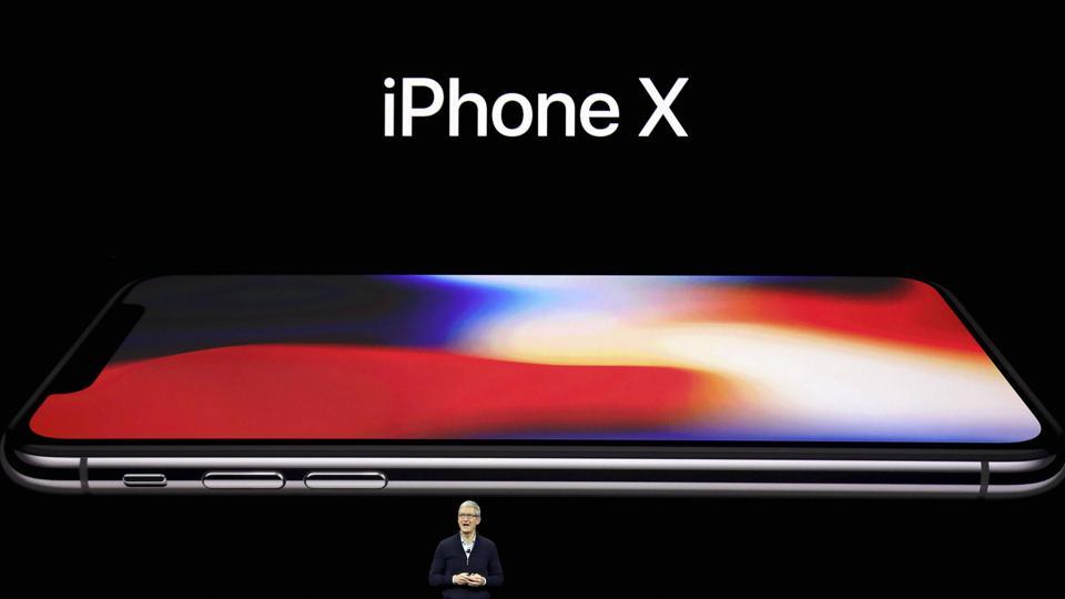 Apple CEO Tim Cook, announces the new iPhone X at the Steve Jobs Theater on the new Apple campus on Tuesday, Sept. 12, 2017, in Cupertino, Calif.