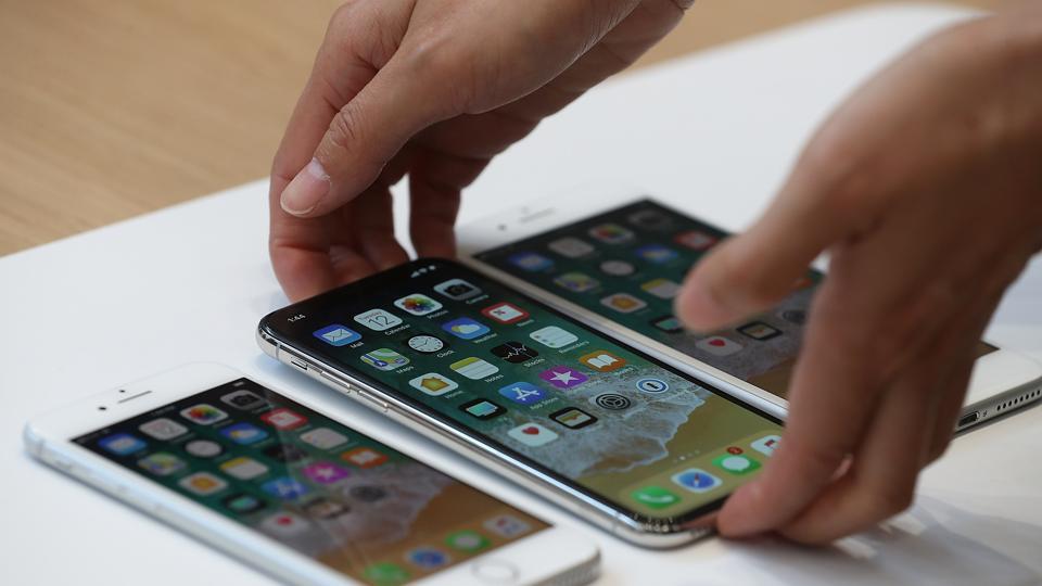 The new iPhone 8, iPhone X and iPhone 8S are displayed during an Apple special event at the Steve Jobs Theatre on the Apple Park campus on September 12, 2017 in Cupertino, California.