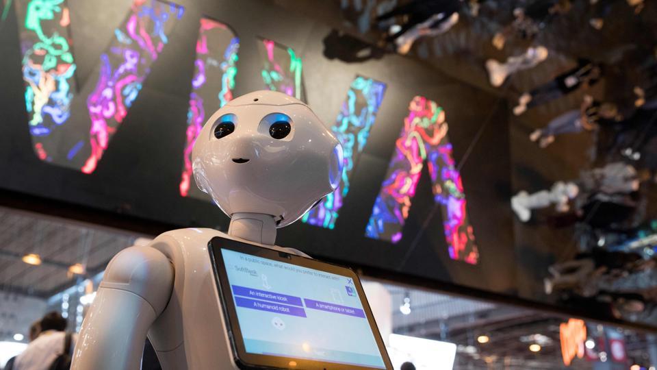 Pepper, a humanoid robot manufactured by SoftBank Robotics, is pictured at the SoftBank Robotics exhibition stand during the VivaTech trade fair (Viva Technology), on May 25, 2018 in Paris.