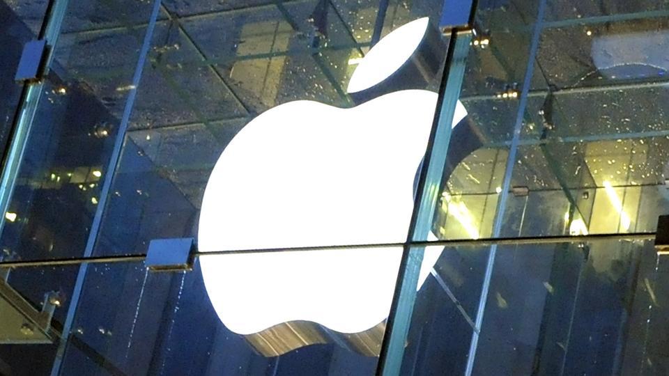 The Apple Inc. logo is displayed at the company's flagship store on Fifth Avenue in the early morning hours in New York.