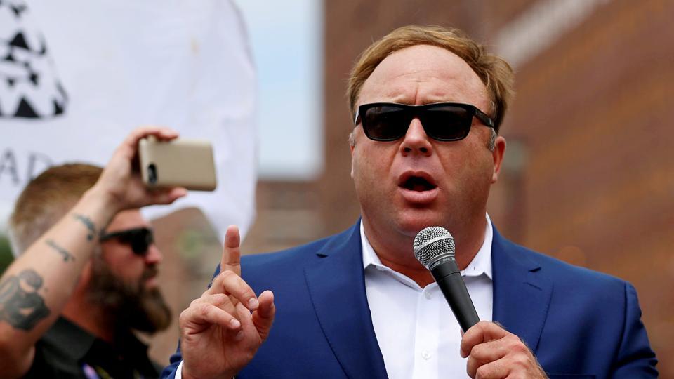 Alex Jones from Infowars.com speaks during a rally in support of Republican presidential candidate Donald Trump near the Republican National Convention in Cleveland, Ohio, U.S.