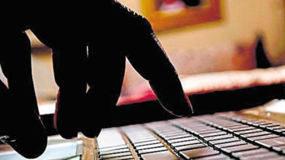 cyber crime hacker typing on laptop cyber crime hacker typing on laptop
