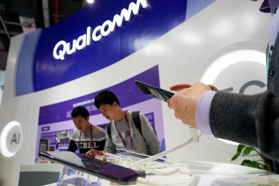 A Qualcomm sign is seen during the China International Import Expo (CIIE), at the National Exhibition and Convention Center in Shanghai, China November 7, 2018. REUTERS/Aly Song