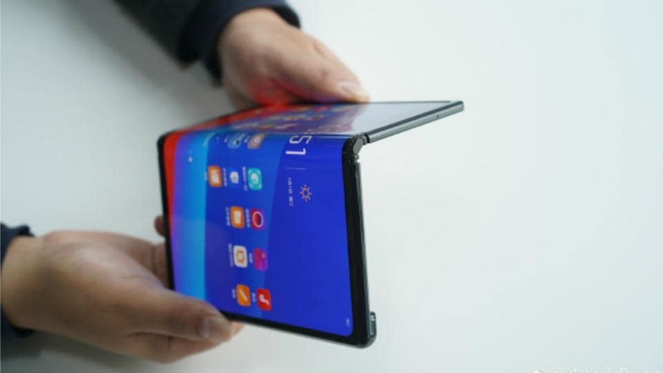 Oppo’s VP Brian Shen shows off the company’s foldable phone.