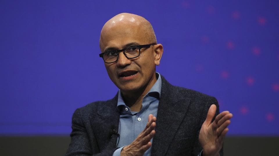 Satya Nadella, chief executive officer of Microsoft Corp., gestures as he speaks during a keynote session on the opening day of the MWC Barcelona in Barcelona, Spain.