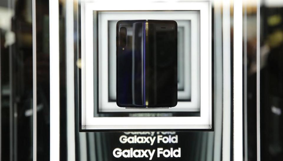 A Galaxy Fold smartphone stands on display at the Samsung Electronics Co. pavilion on the opening day of the MWC Barcelona in Barcelona.