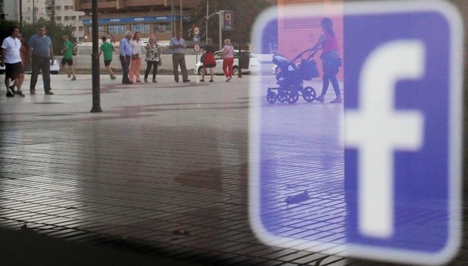 Facebook logo is seen on a shop window in Malaga, Spain, June 4, 2018. REUTERS/Jon Nazca/Files