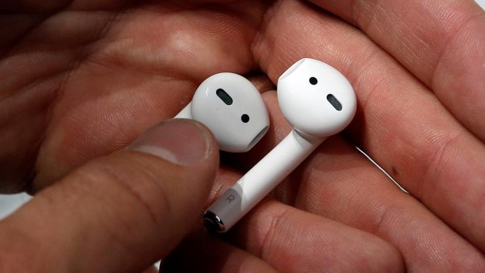 Apple AirPods are displayed during a media event in San Francisco.