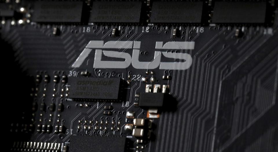 This Feb 23, 2019, photo shows the inside of a computer with the ASUS logo in Jersey City, N.J. Security researchers say hackers infected tens of thousands of computers from the Taiwanese vendor ASUS with malicious software for months last year through the company’s online automatic update service. Kaspersky Labs said Monday, March 25, that the exploit likely affected more than 1 million computers from the world’s No. 5 computer company, though it was designed to surgically install a backdoor in a much smaller number of PCs.
