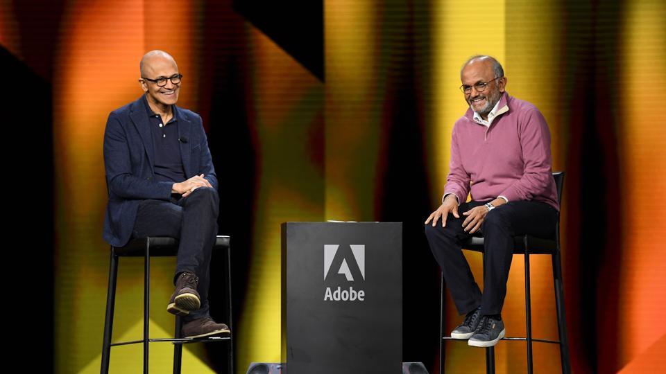 IMAGE DISTRIBUTED FOR ADOBE - Adobe CEO, Shantanu Narayen (right) and Microsoft CEO, Staya Nadella sit down at Adobe Summit to discuss culture, tech trends, customer experience and digital transformation in Las Vegas.