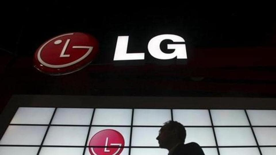 A show attendee passes by the LG Electronics booth during the 2009 International Consumer Electronics Show (CES) in Las Vegas, Nevada, January 9, 2009. REUTERS/Steve Marcus/Files