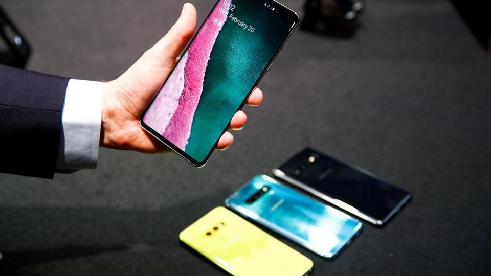 A journalist holds the new Samsung Galaxy S10 smartphone at a press event in London, Britain February 20, 2019.