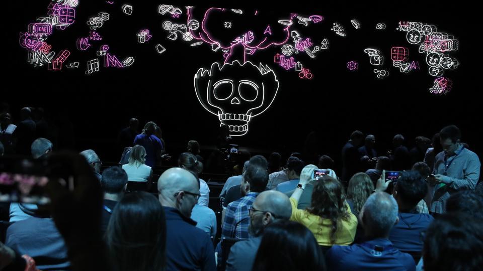 Attendees take pictures before the start of the 2019 Apple Worldwide Developer Conference (WWDC) at the San Jose Convention Center on June 03, 2019 in San Jose, California. The WWDC runs through June 7.