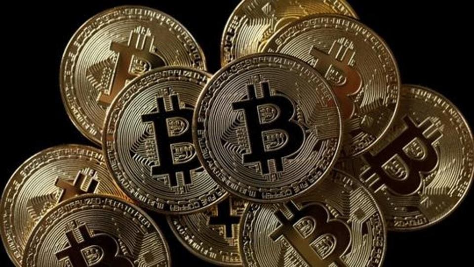 A collection of Bitcoin (virtual currency) tokens are displayed in this picture illustration taken December 8, 2017. A collection of Bitcoin (virtual currency) tokens are displayed in this picture illustration taken December 8, 2017.