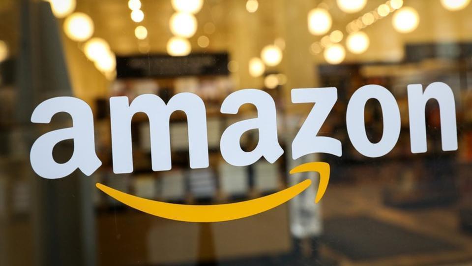 The logo of Amazon is seen on the door of an Amazon Books retail store in New York City, U.S., February 14, 2019.