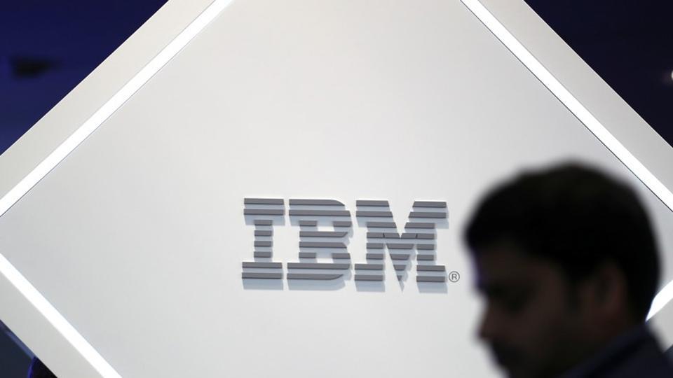 A man stands near an IBM logo at the Mobile World Congress in Barcelona, Spain, February 25, 2019.